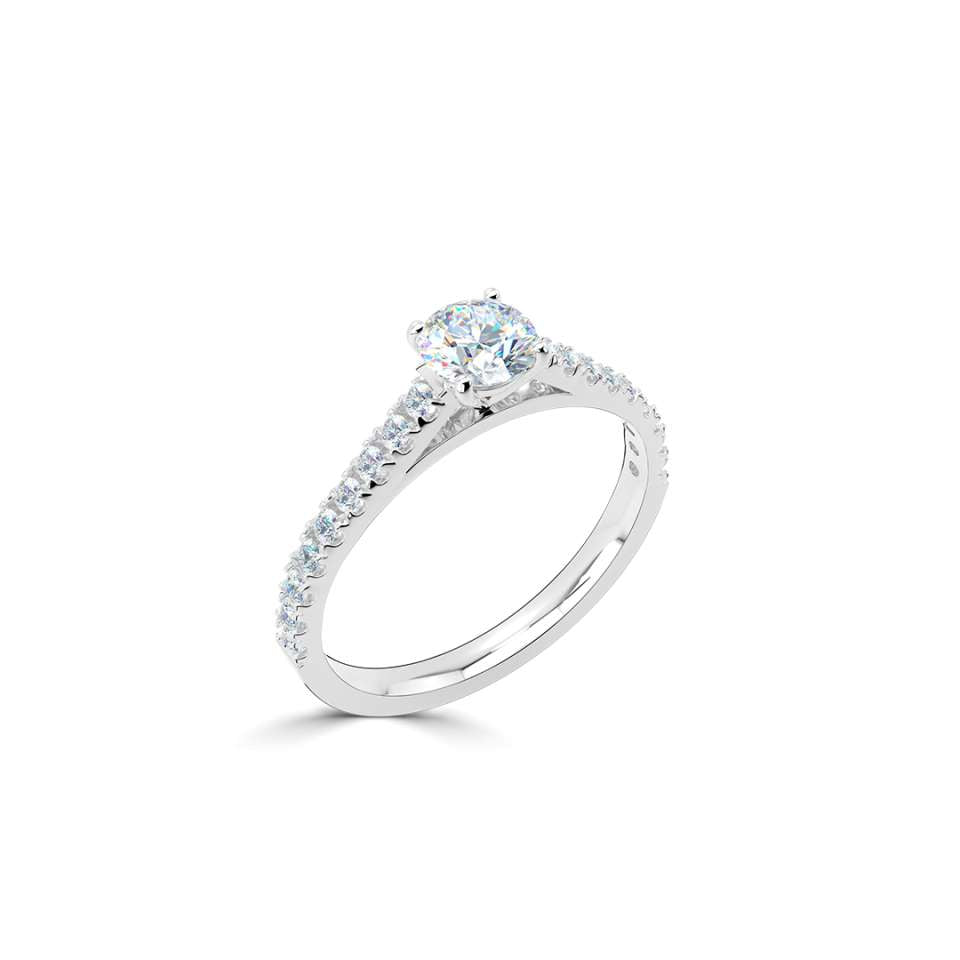 Classic four claw diamond ring with diamond set shoulders