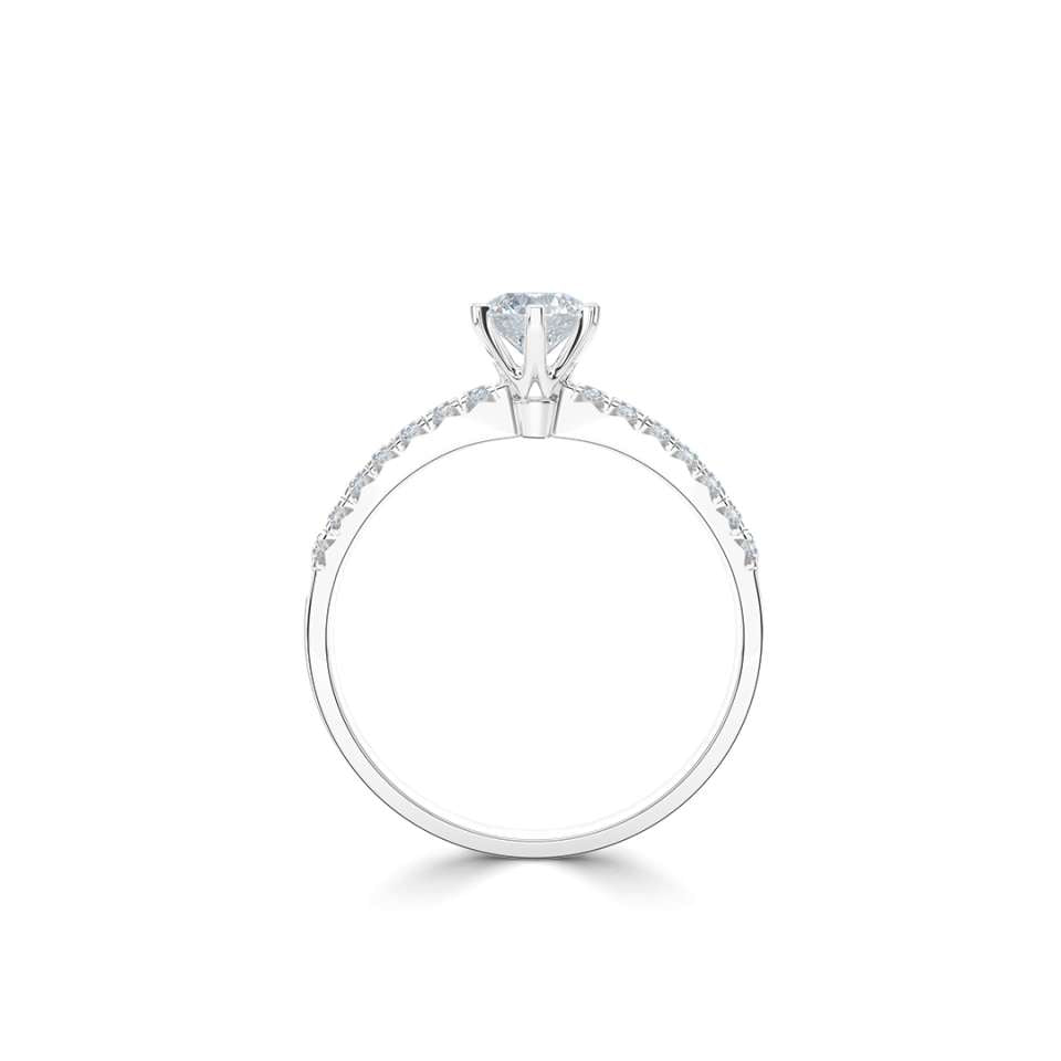 A timeless six-claw solitaire featuring fishtail-set diamond shoulders.